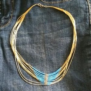Silver multi-strand turquoise necklace.